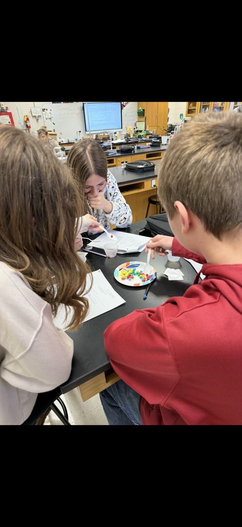 One student helping another out