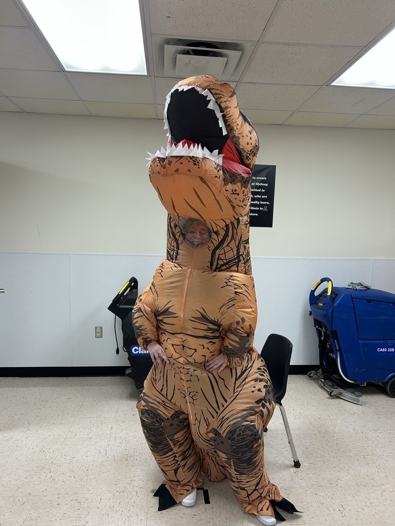 Alana in a dinosaur costume. 