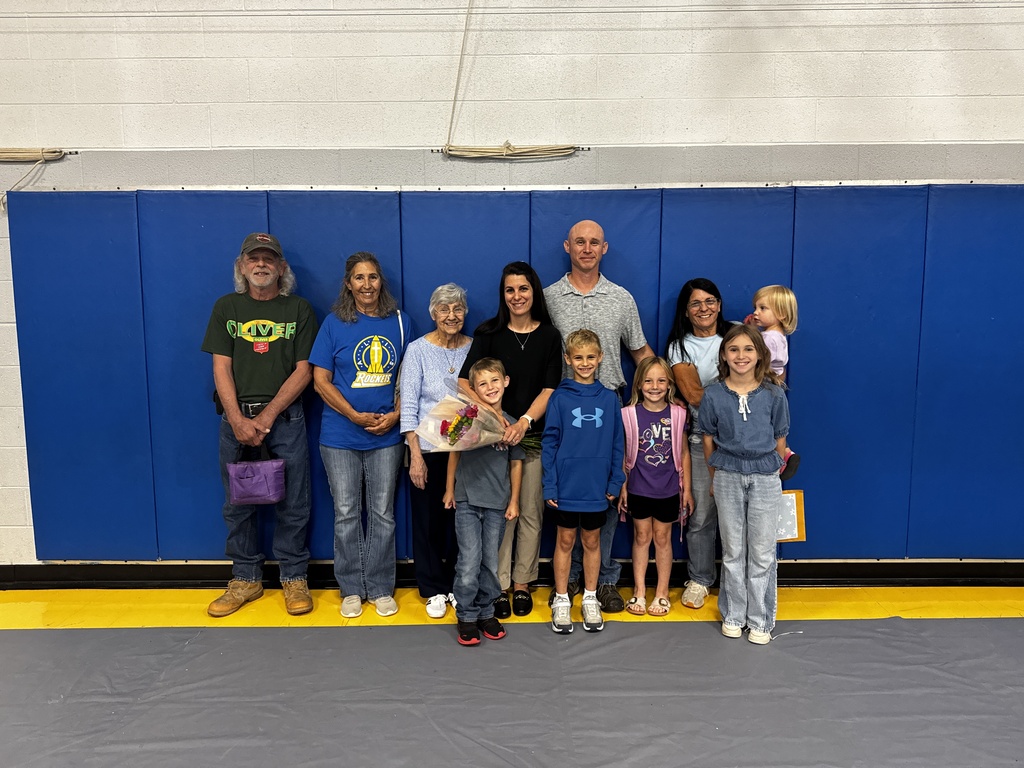 Mrs. Morrison with her family.