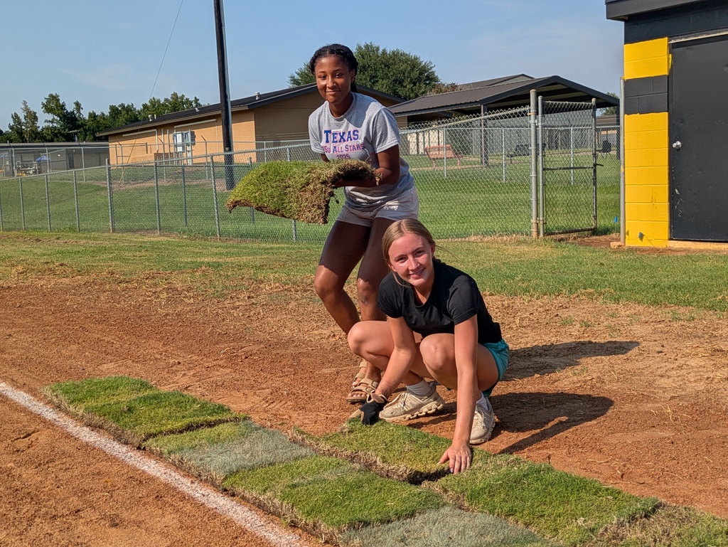 softball player laying sod