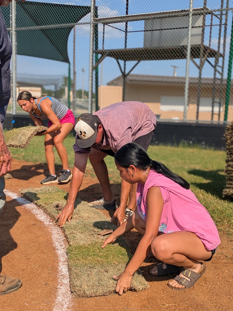 softball player laying sod