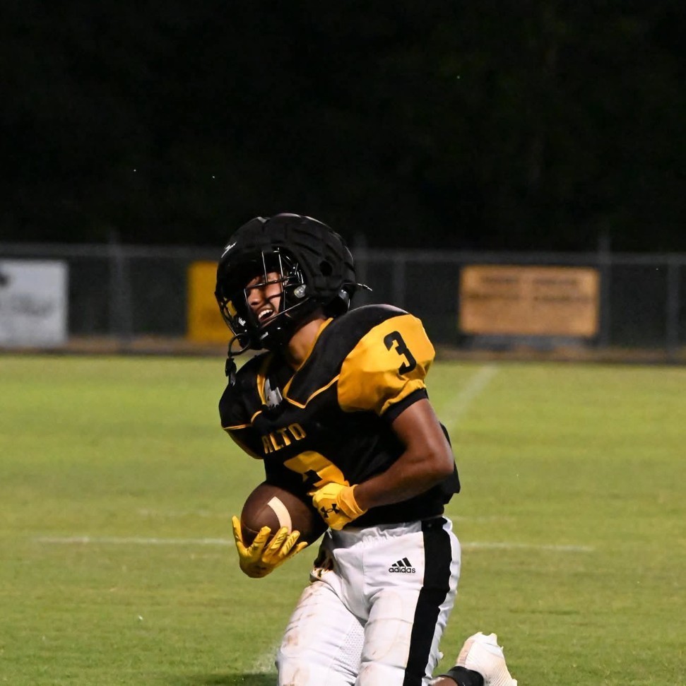runningback carrying the ball
