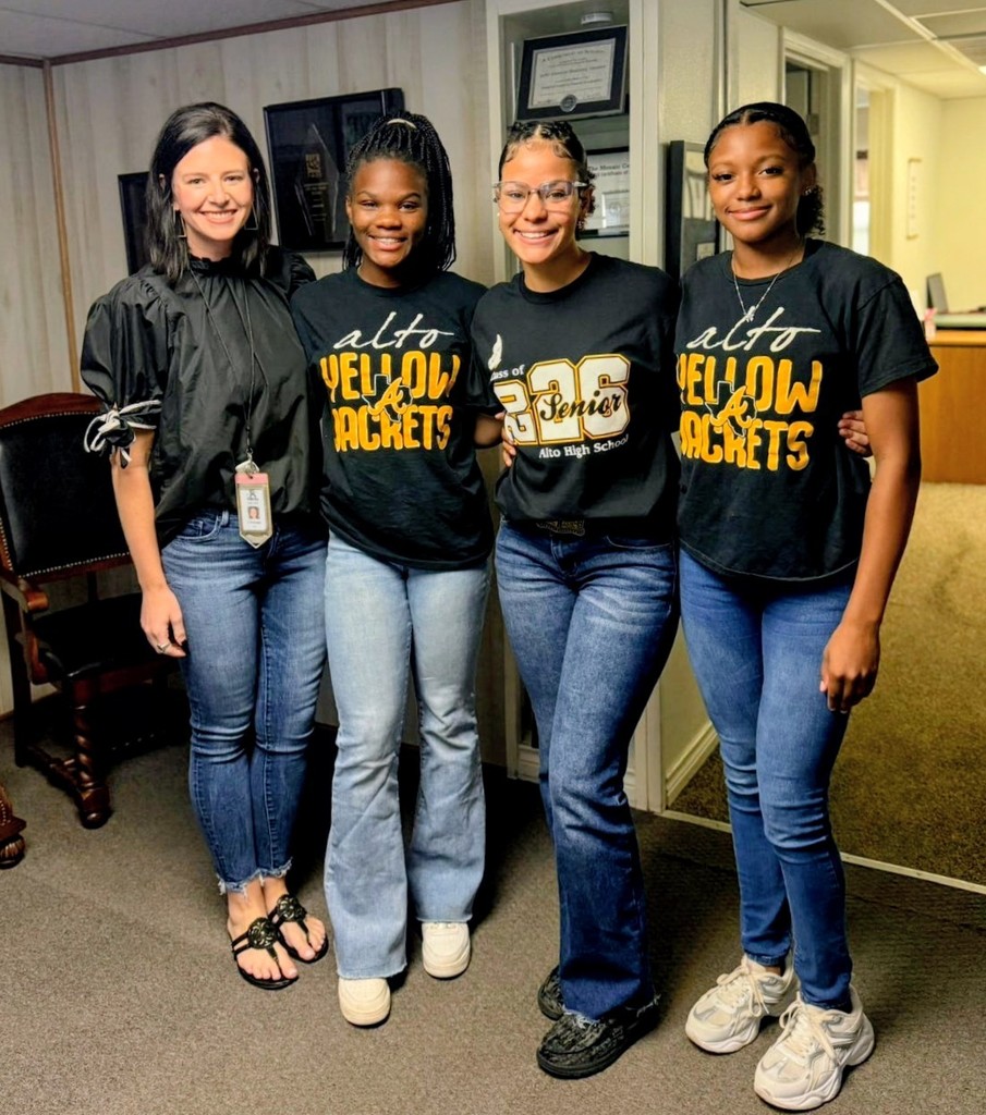 students and sponsor posing for a picture