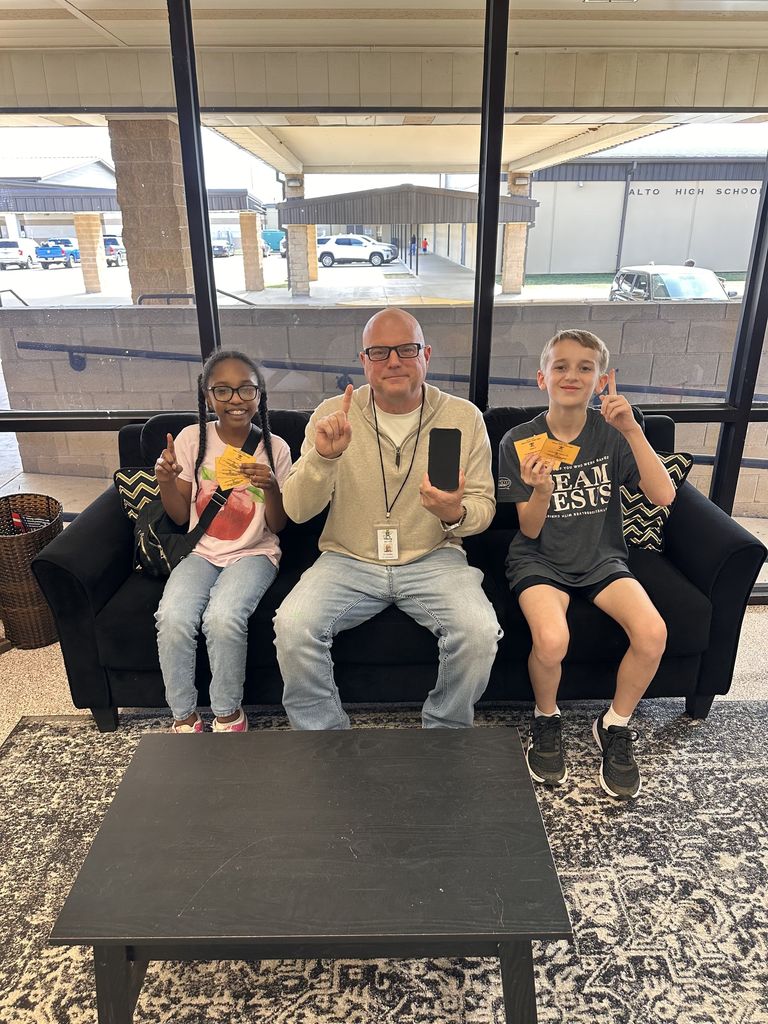 Mr. Conley with two students