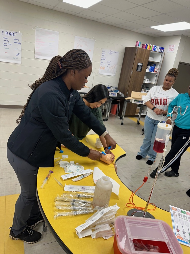 Health Science students practicing IVs