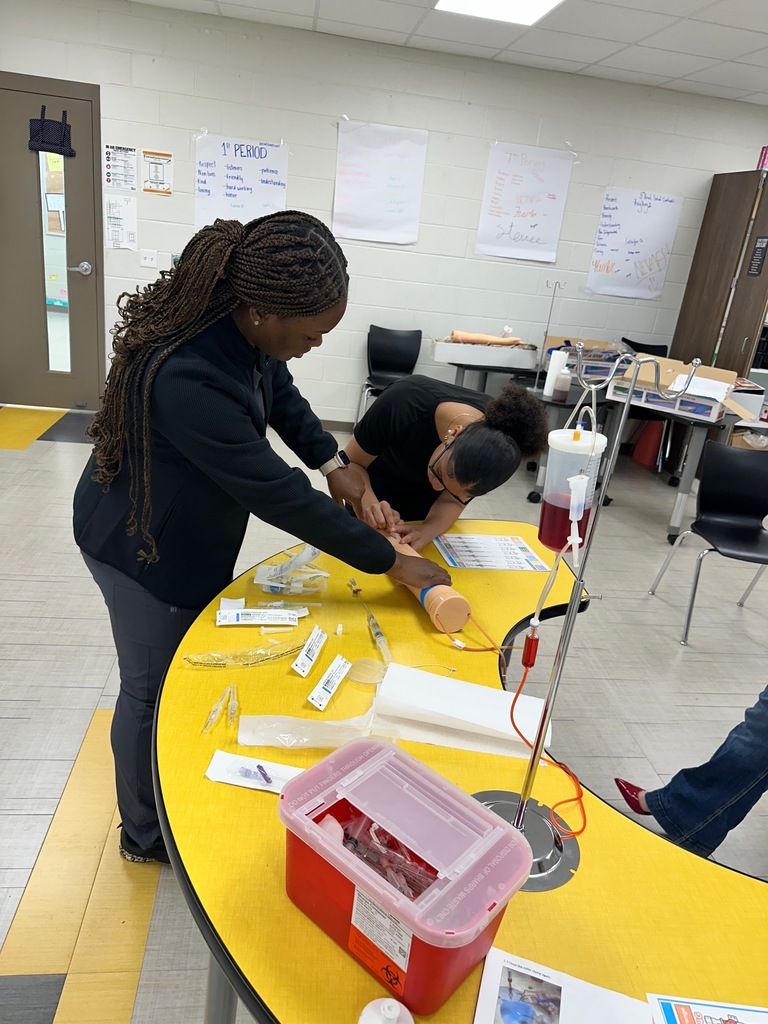 Health Science students practicing IVs