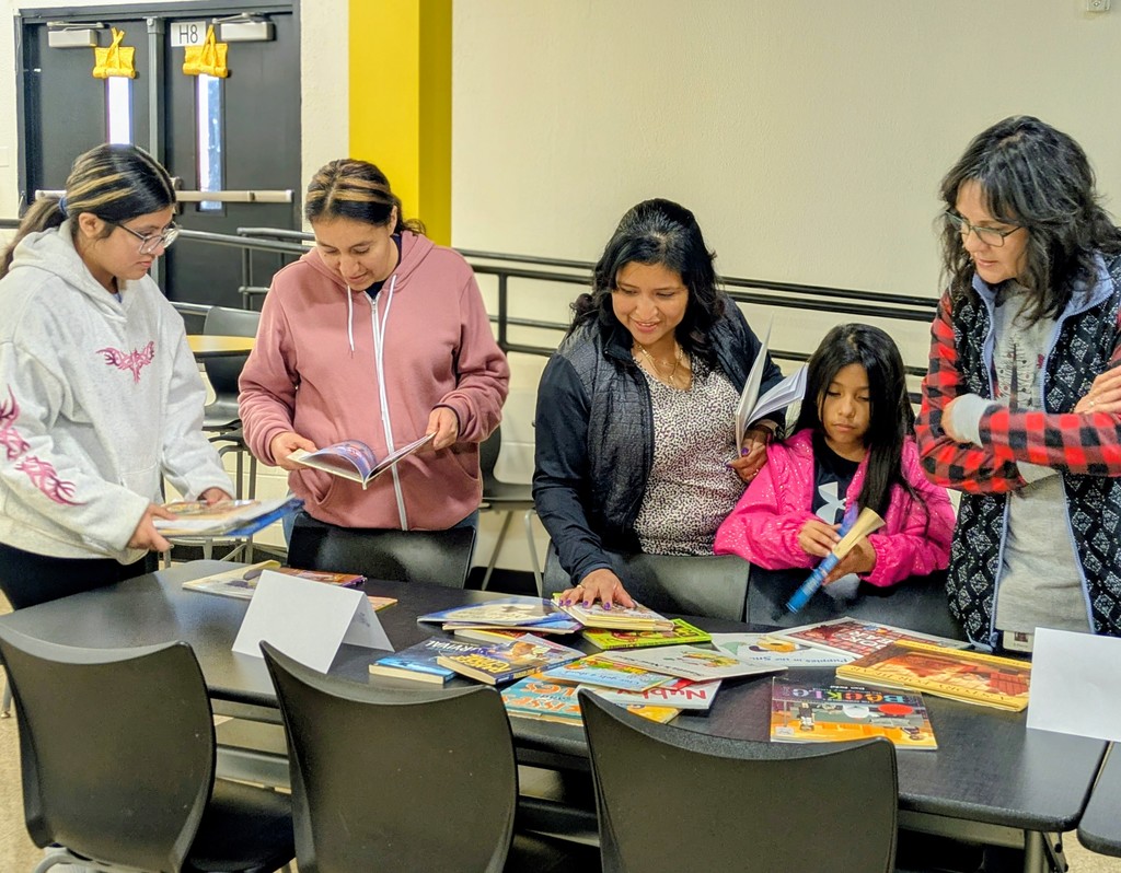 ladies looking at books