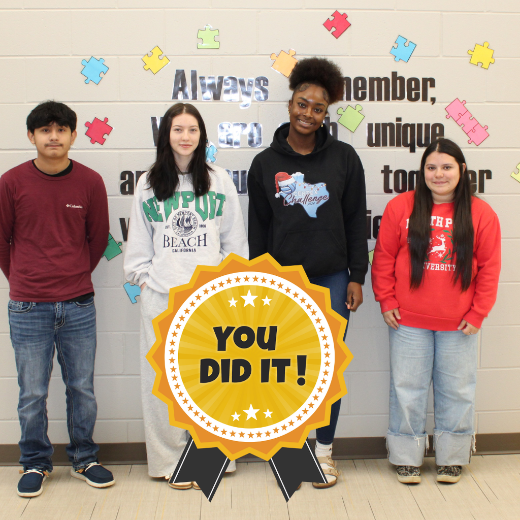 four students posing for a picture