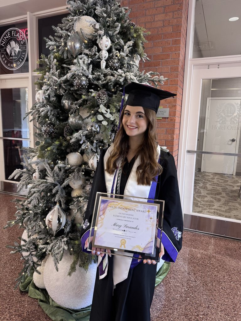 Ms. Sarandos in her cap and gown
