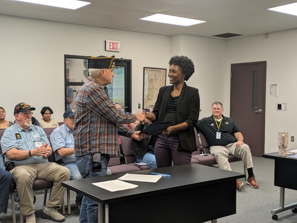 Mrs. Dorsey accepting award