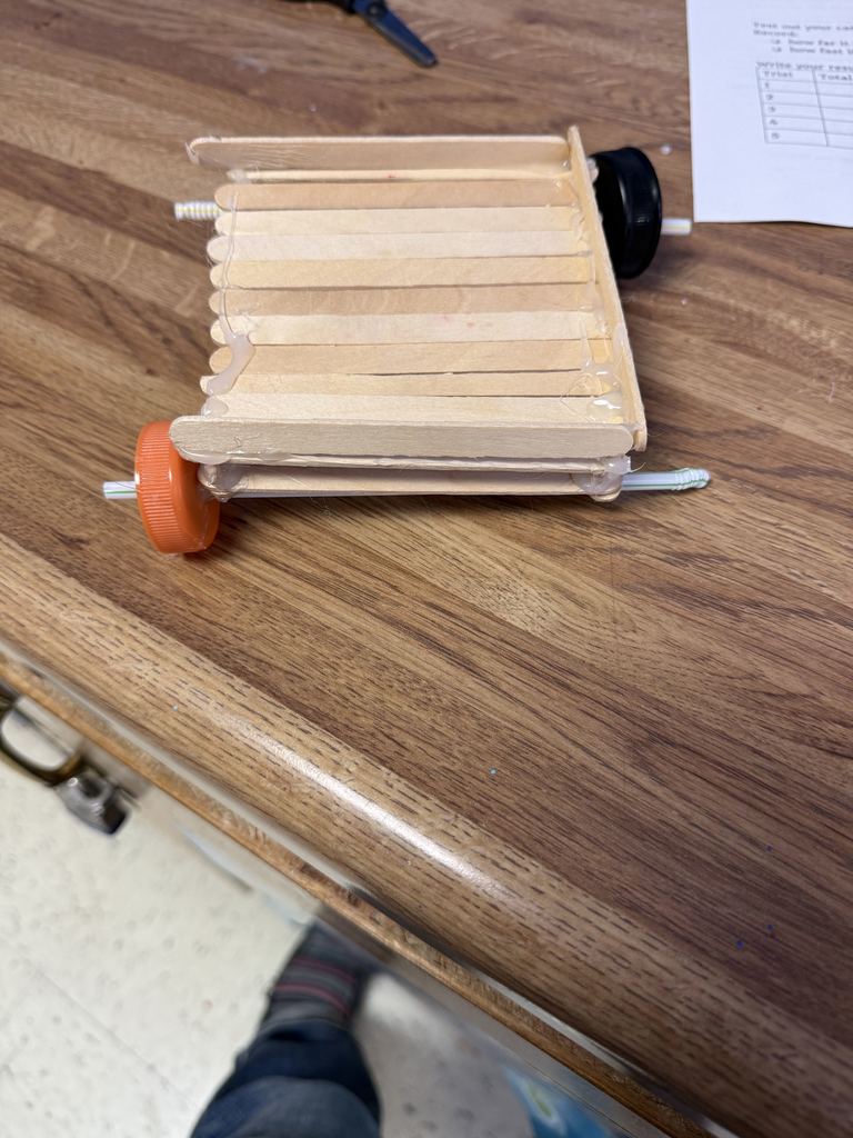 Earlier in the school year, 8th Grade Science classes created Rubber Band Cars to demonstrate the transfer of elastic energy to mechanical energy.   They had a blast designing and testing their cars!