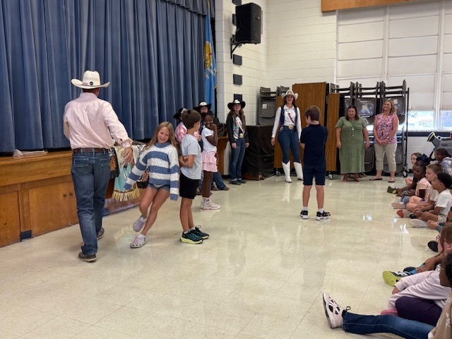 Student barrel racing.