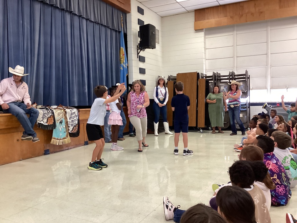 Teacher barrel racing.