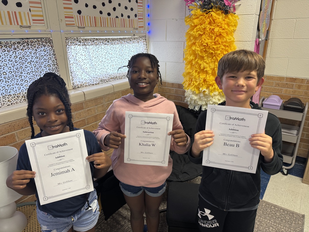 Students with their xtra math certificates