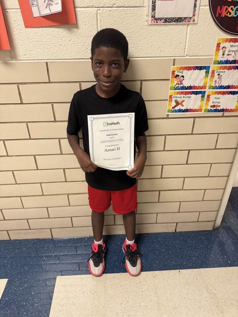 Amari with his certificate. 