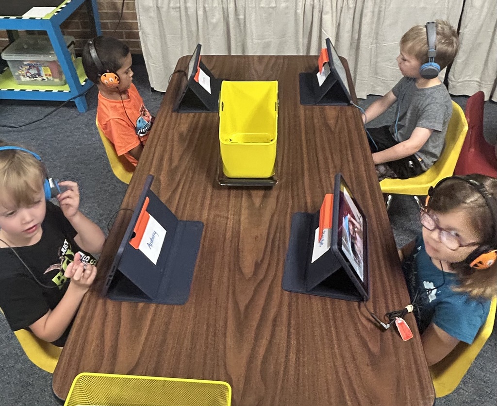students playing at centers