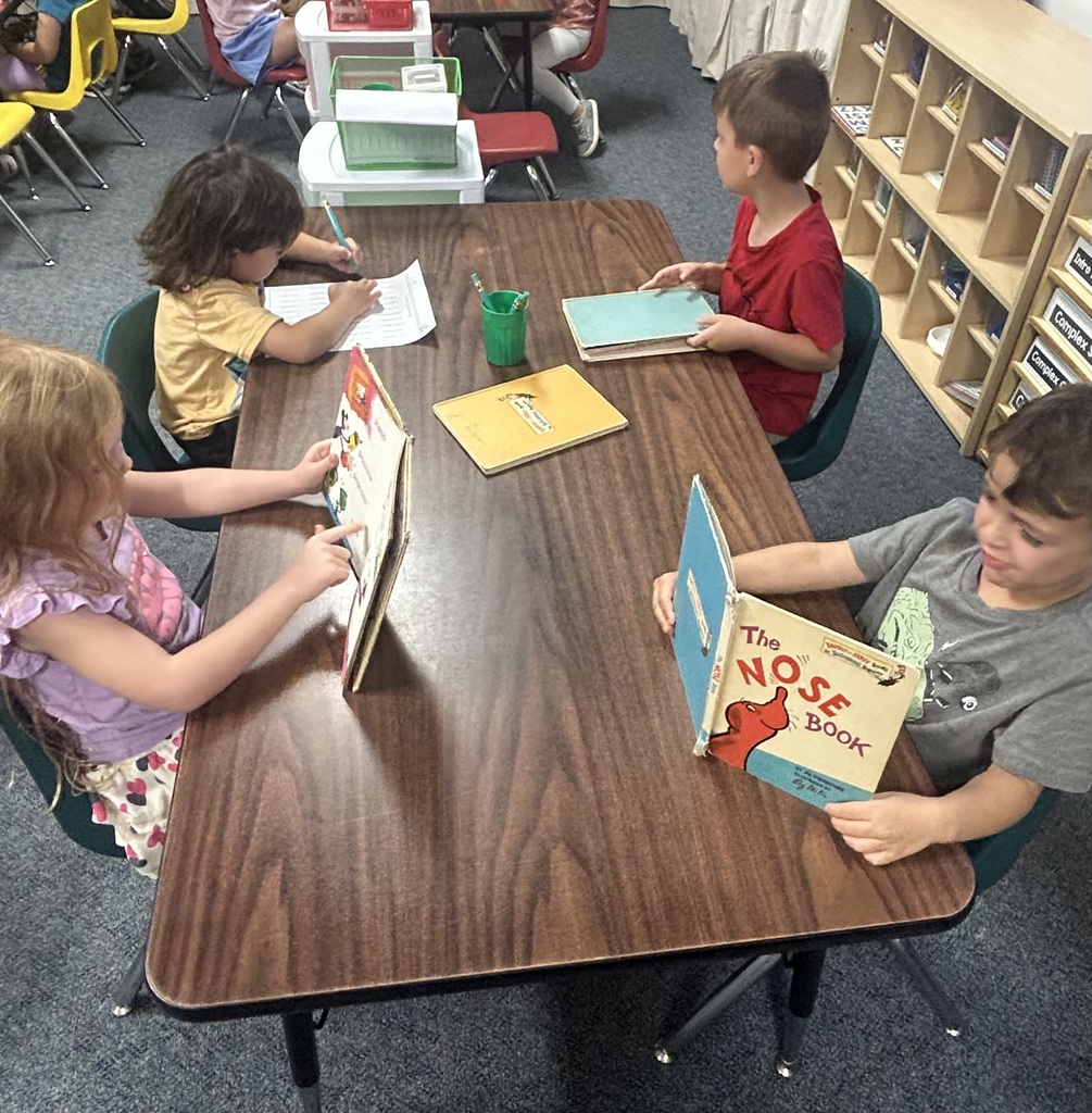 students playing at centers
