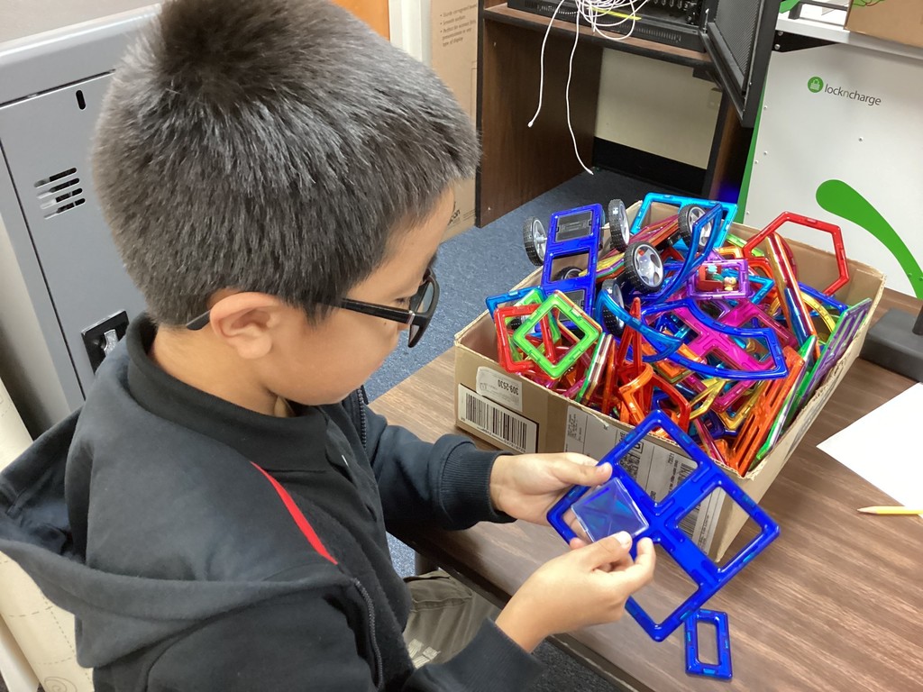 student engaging in stem