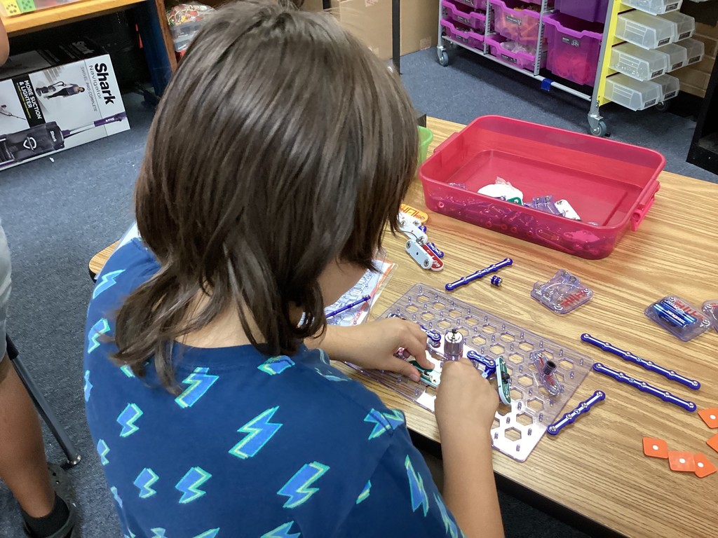 student engaging in stem