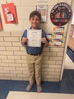 Mark with his certificate.