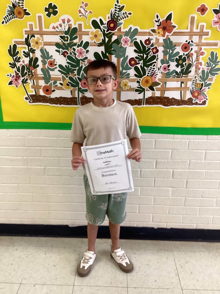 student with his certificate