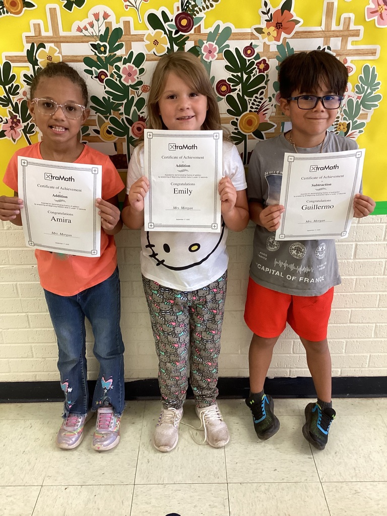Students with their certificates.
