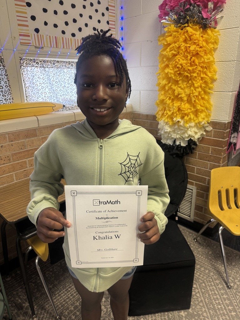 Khali with her certificate.