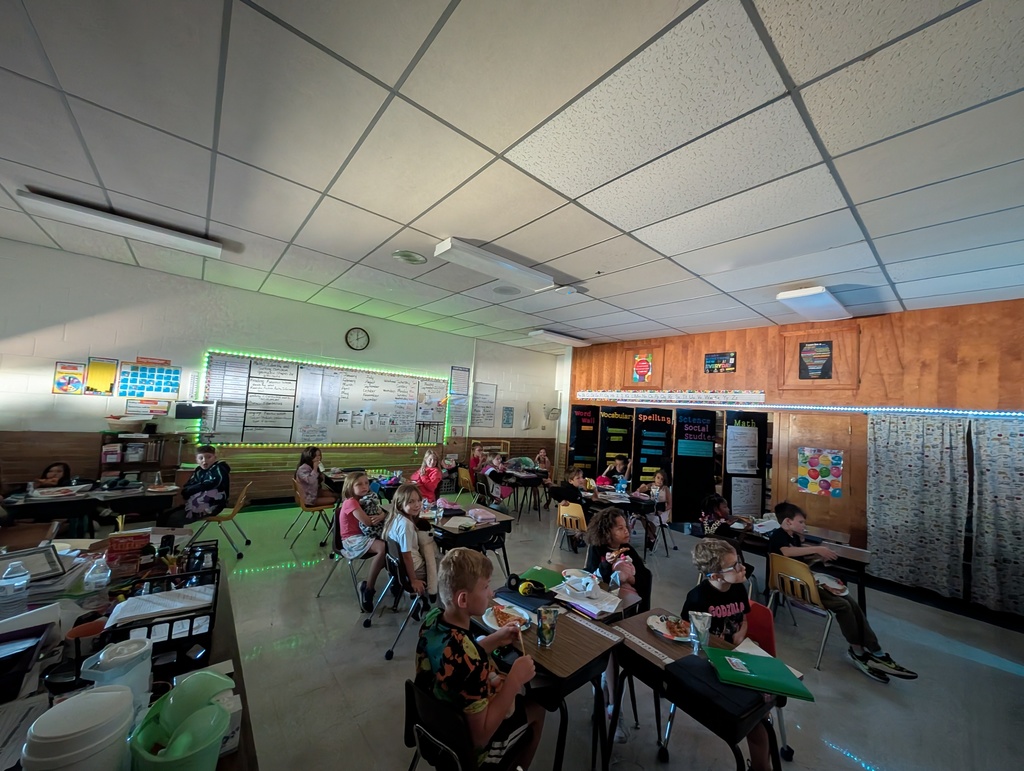 students having a pizza party