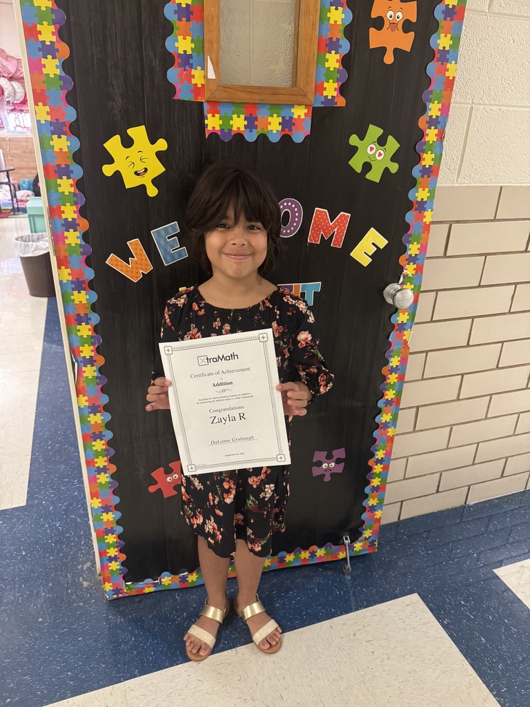 Student with her certificate.