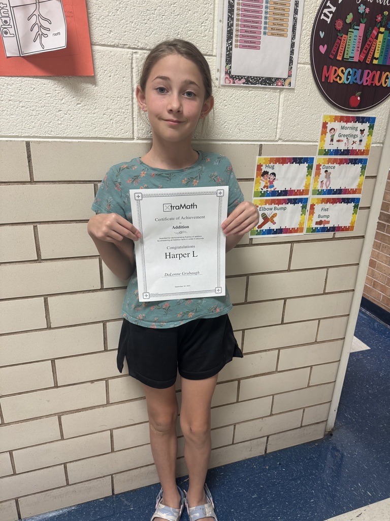 Student with her certificate.