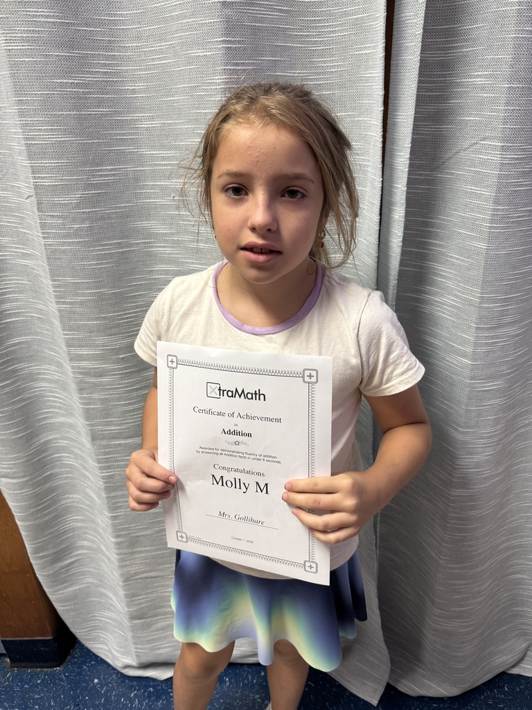 student with her certificate