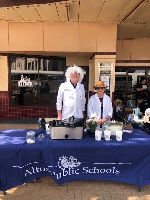 Mr. Worbes and Dr. Lana Mowdy pose at their booth where they were serving chili!
