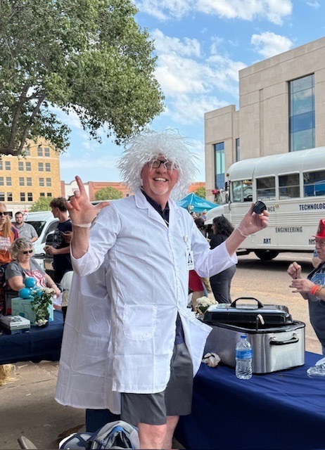 Mr. Worbes helps out at the Chili Cook Off!