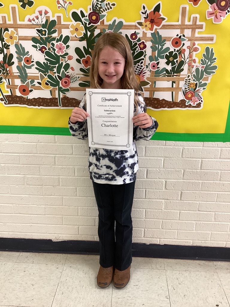 Students with certificates. 