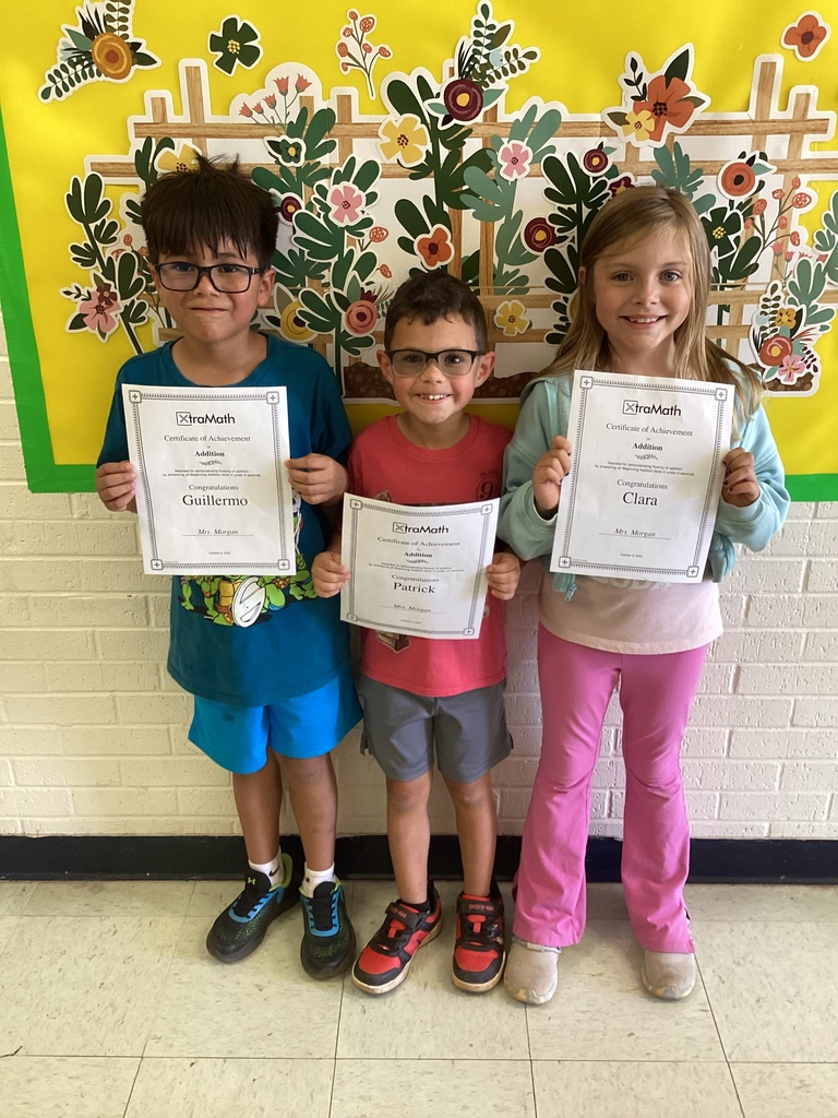 Students with certificates. 