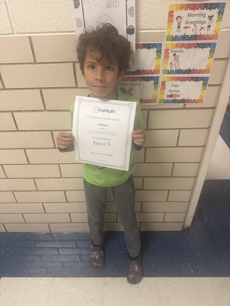student with their certificate