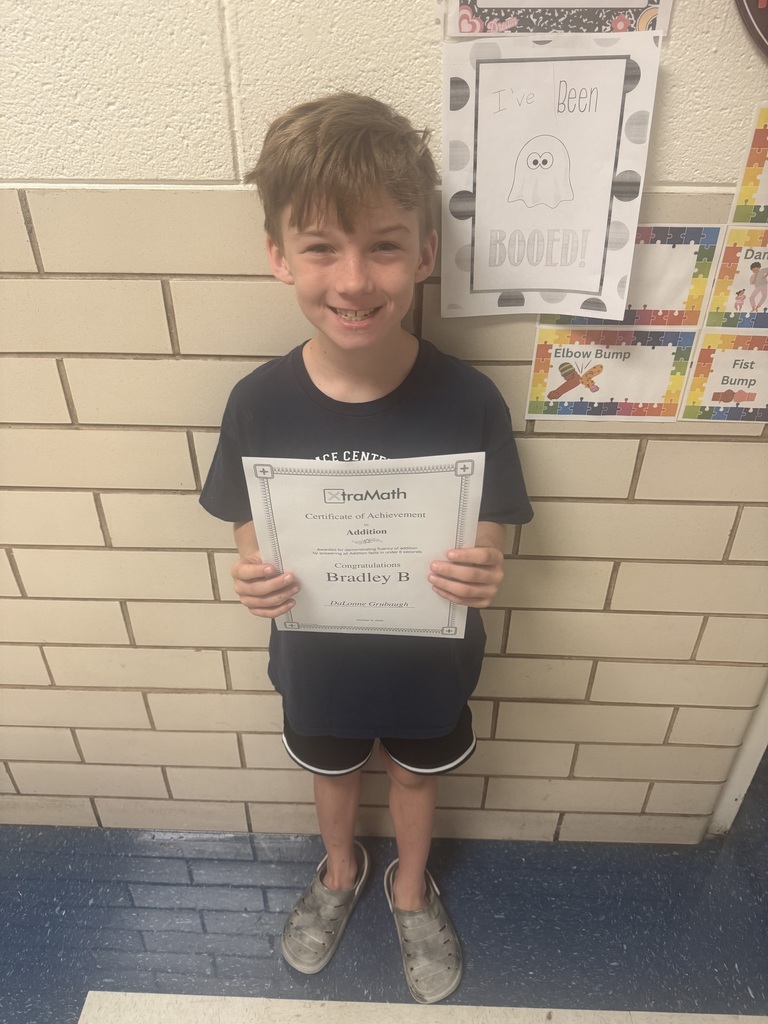 student with their certificate