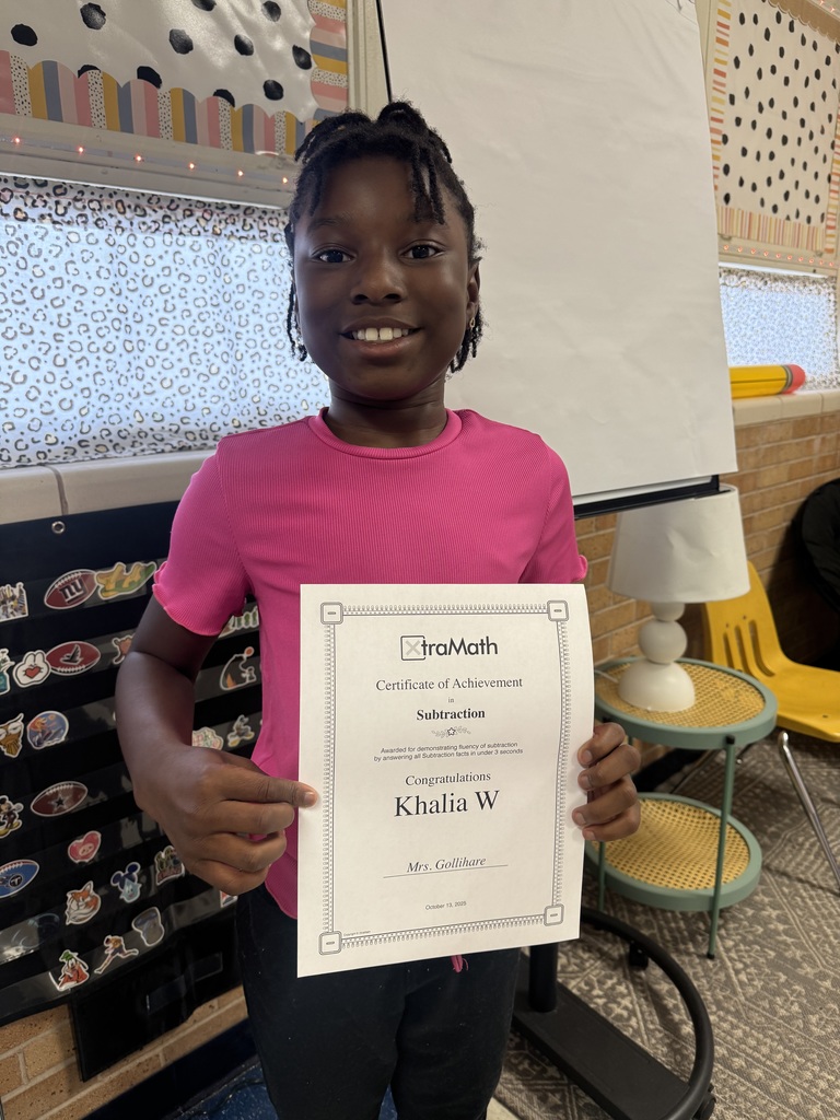 student with her certificate