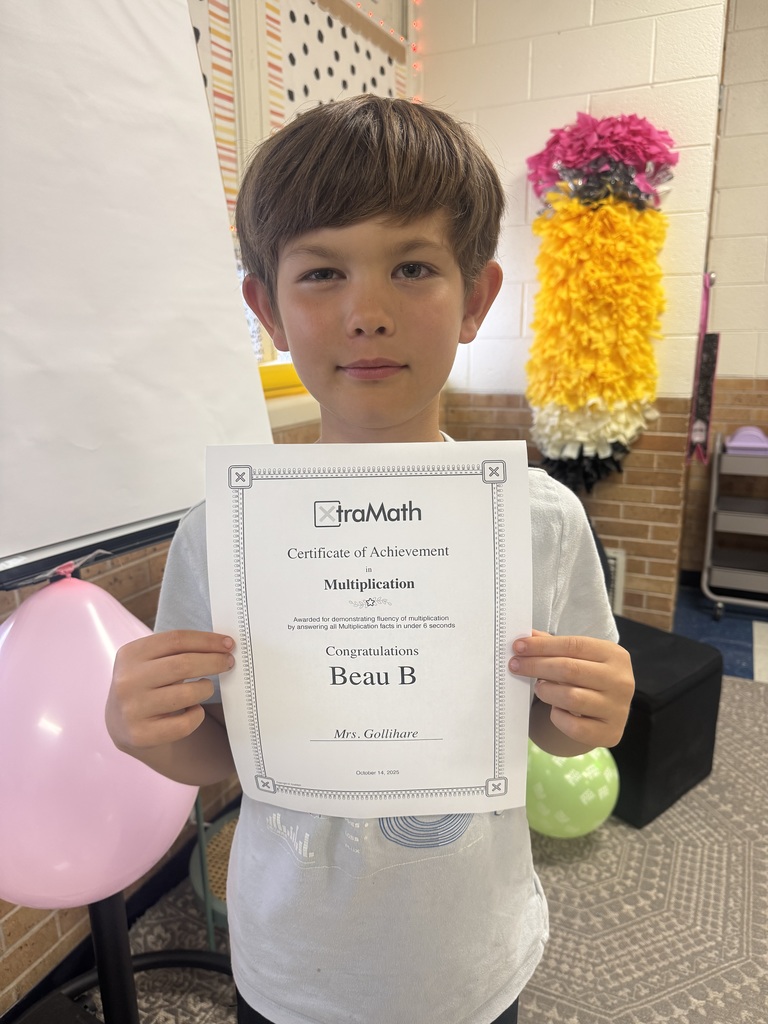 student with his certificate