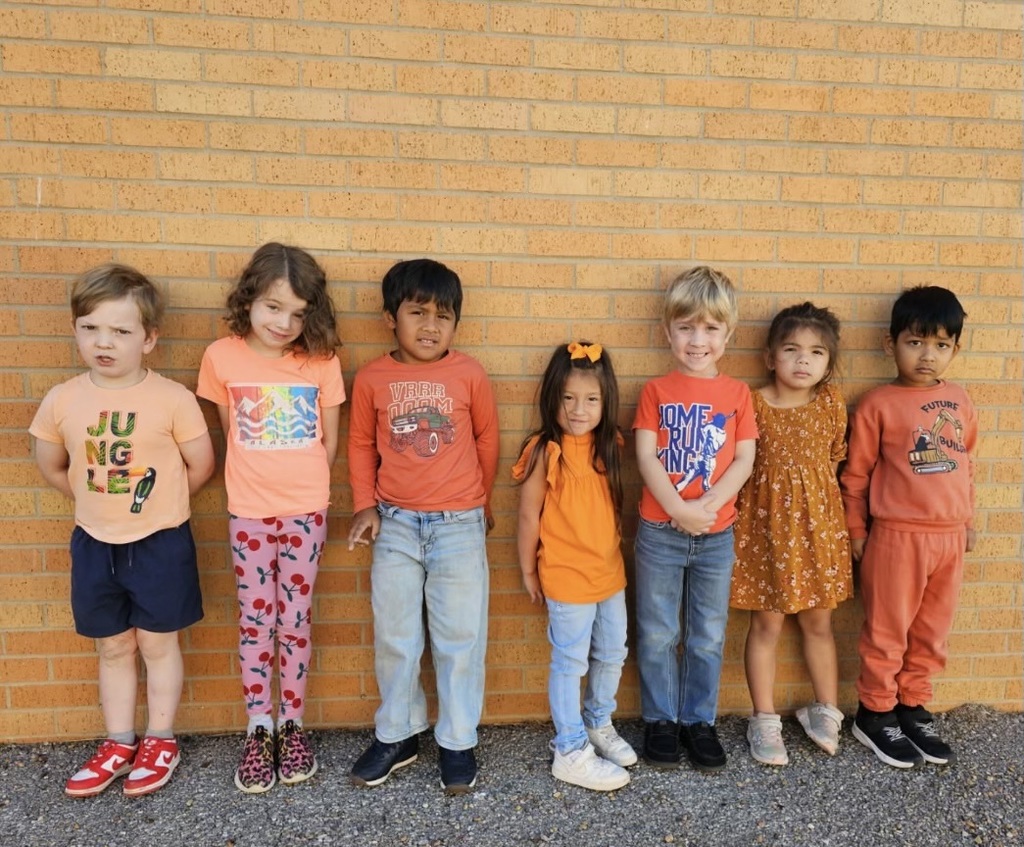Students showing unity by wearing orange. 