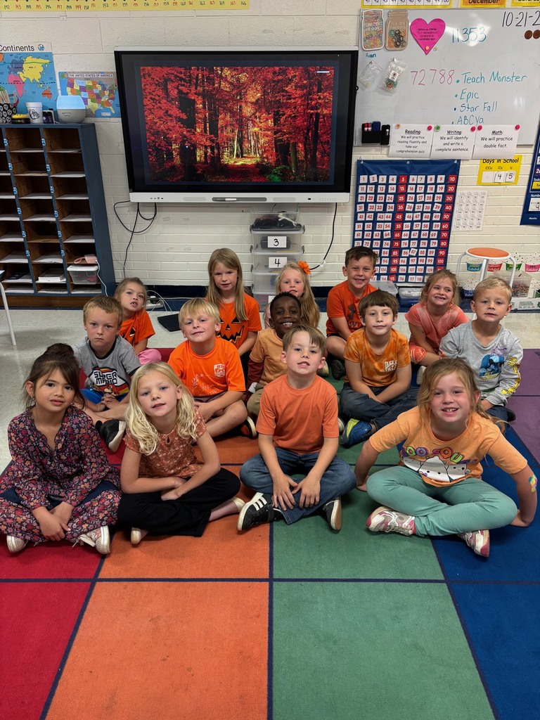 Students showing unity by wearing orange. 