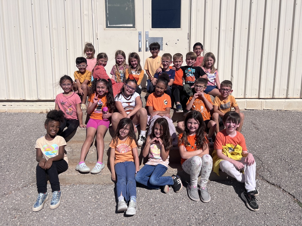 Students showing unity by wearing orange. 