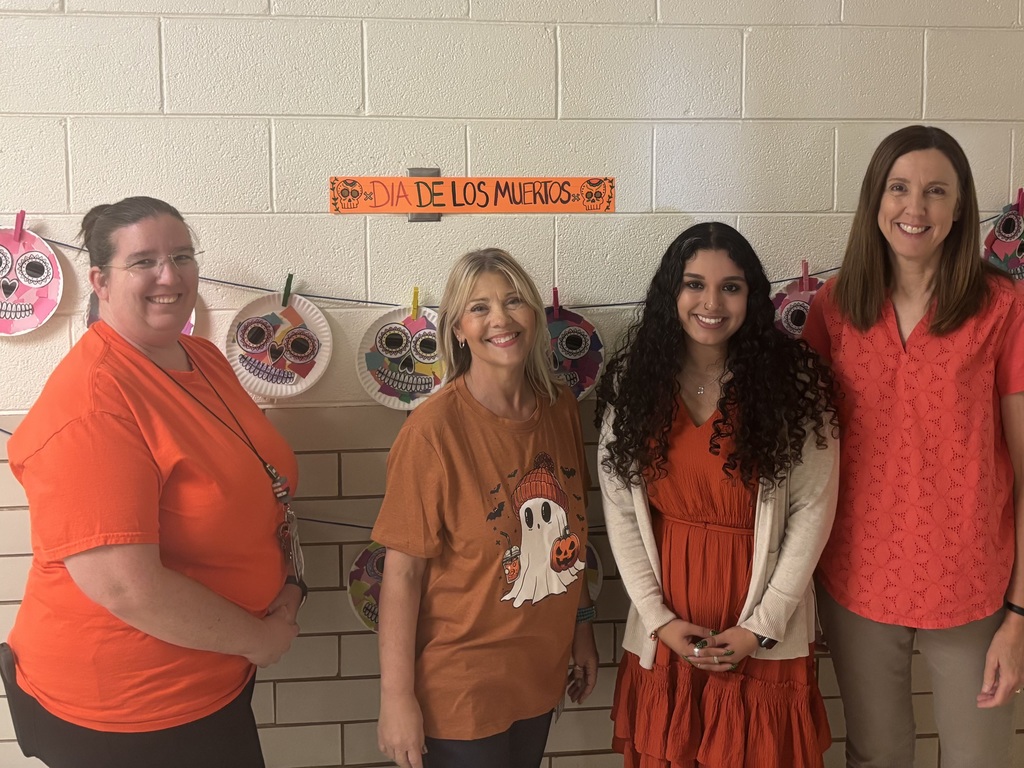 teachers  showing unity by wearing orange. 