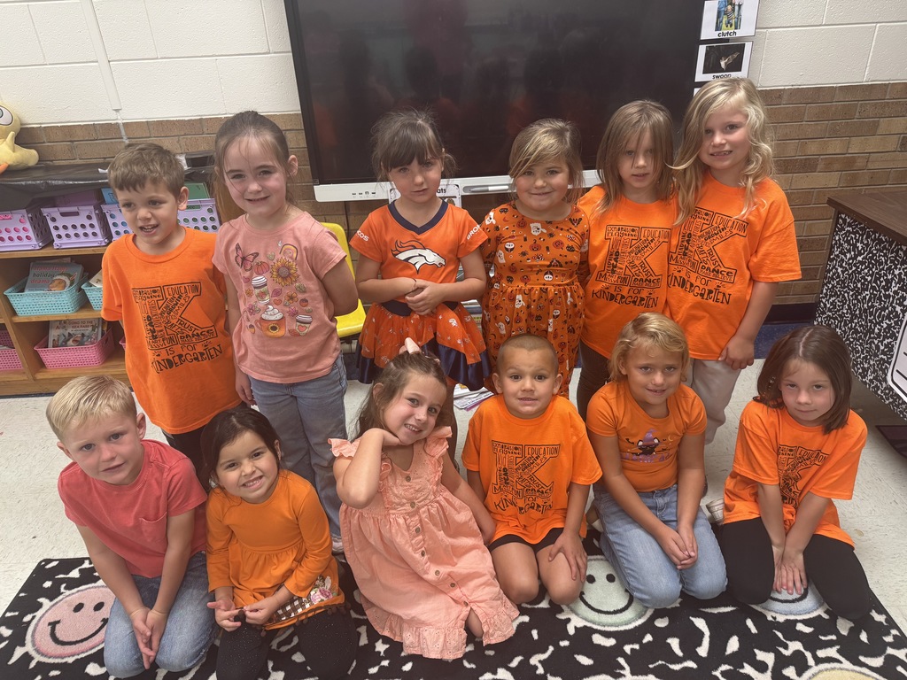 Students showing unity by wearing orange. 