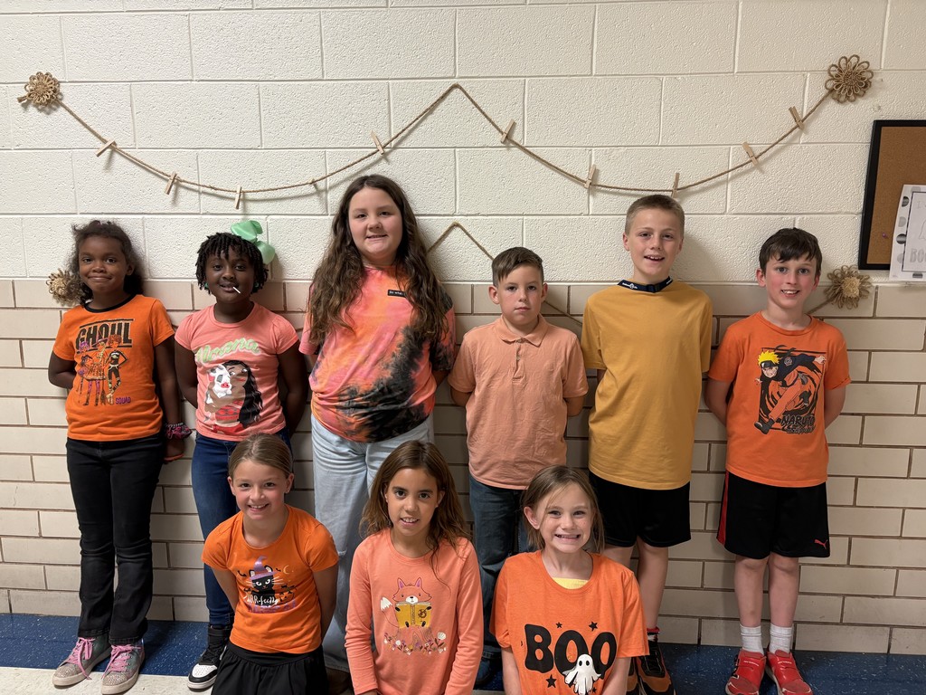 Students showing unity by wearing orange. 
