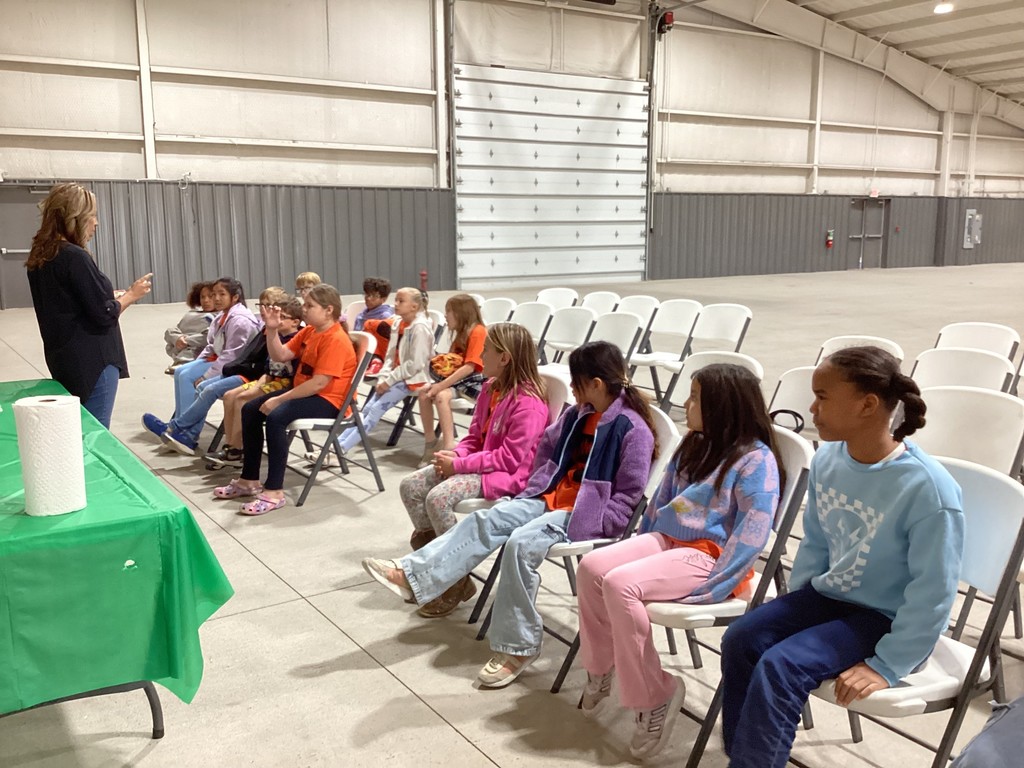 students listening to a speaker