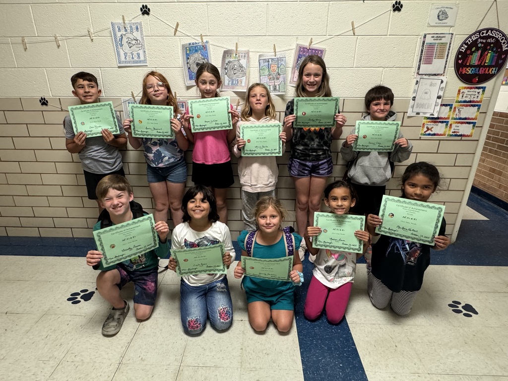 Students with their certificates. 