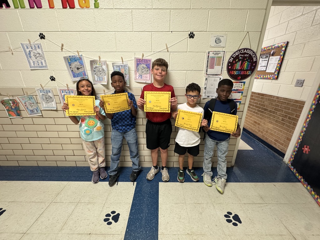 Students with their certificates. 