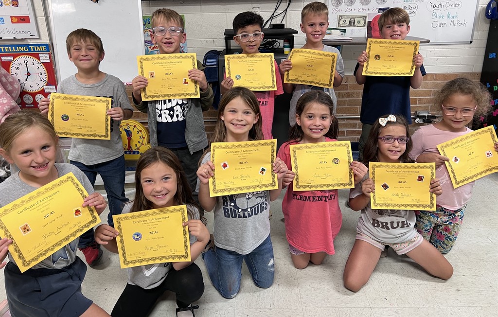 students with their certificates