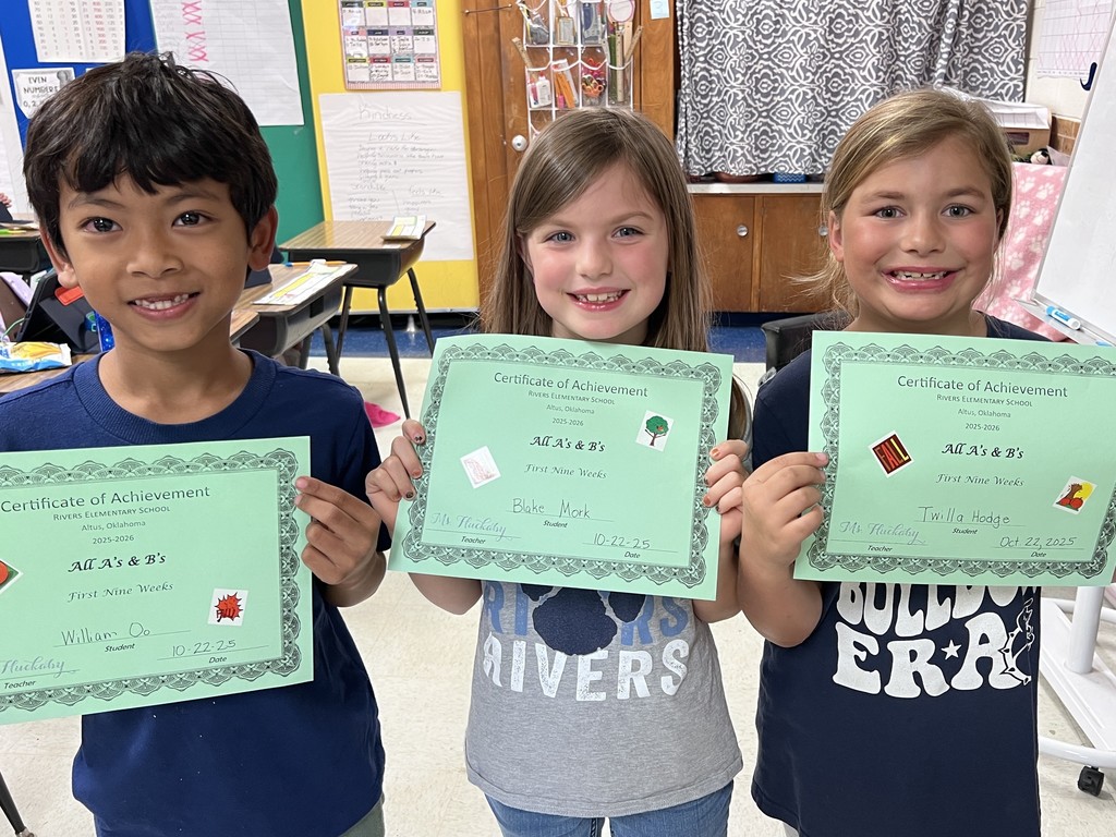 students with their certificates